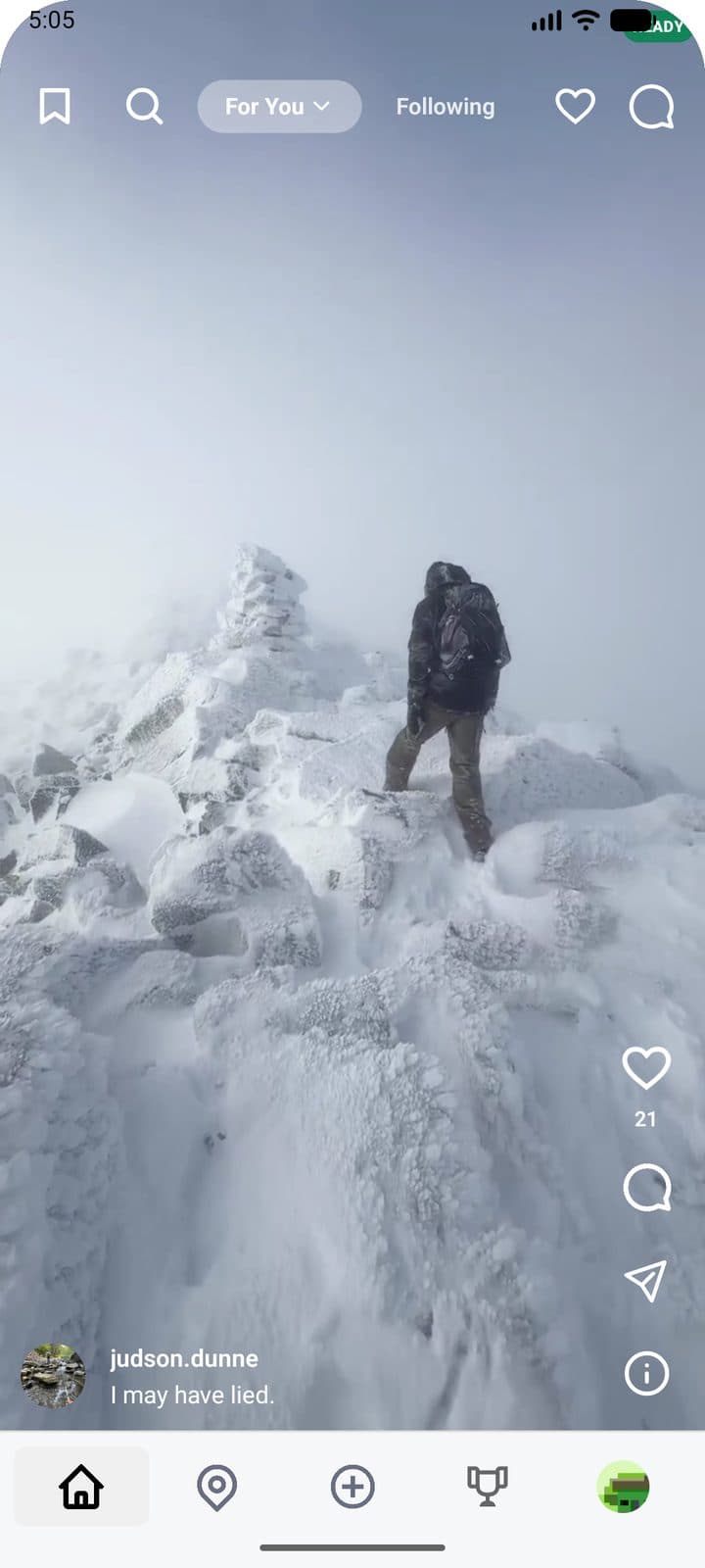 Locava feed showing a hiker on a snowy ridge
