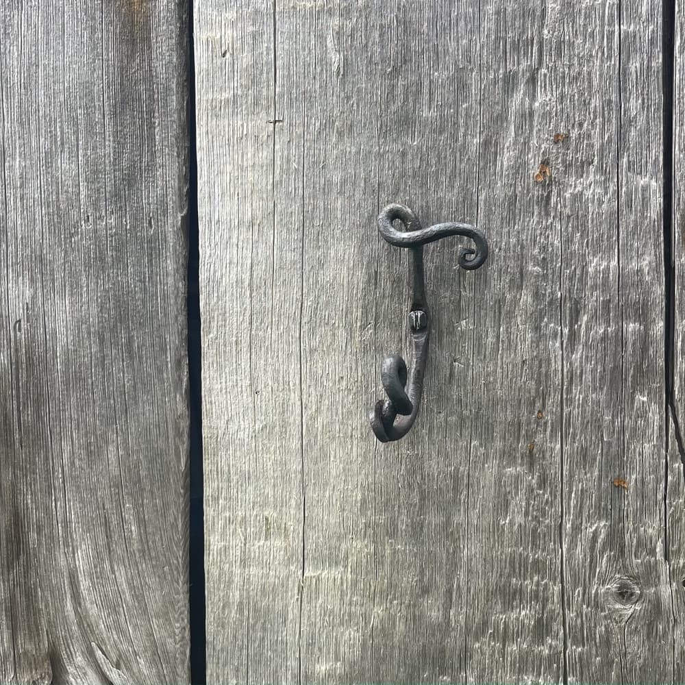 A forged ivy-leaf wall hook